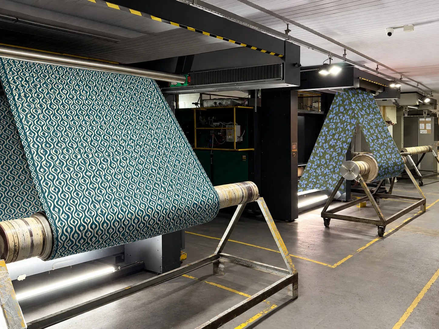 Printed fabrics coming off the machine at the print plant